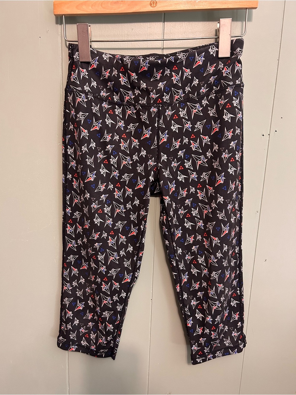 Sweaty Betty Black Capri Leggings with Red, White & Blue Paper Crane Print